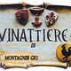 Insegna d'epoca con scritta "Vinattiere di Montagner Gio." su pergamena stilizzata.