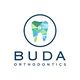 Geometric tooth logo with "Buda Orthodontics" text below.