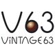 Logo mit Text "Vintage 63", stilisiert mit einer braunen Kugel im Buchstaben "V" und der Zahl "63".