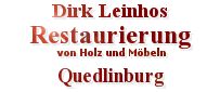 Textbild mit roter Schrift: "Dirk Leinhos Restaurierung von Holz und Möbeln Quedlinburg".