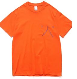 Orange t-shirt with "San Francisco" written in blue, diagonal text on the front.