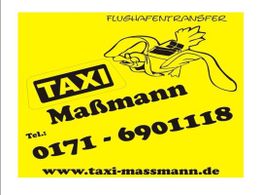 Gelbes Taxi-Schild mit Telefonnummer und Webseite für Flughafentransfer abgebildet.