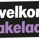 Zwarte achtergrond met de tekst "welkom makelaars" in witte en paarse letters.