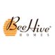 Logo of BeeHive Homes with text and a stylized orange beehive graphic.
