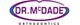 Logo reading "Dr. McDade Orthodontics" with purple and blue design elements.