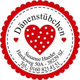Rotes Herz mit Punkten und Text "Dänenstübchen" sowie Adresse und Telefonnummer im Kreis.