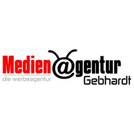 Logo der Medienagentur Gebhardt mit rotem und schwarzem Text auf weißem Hintergrund.