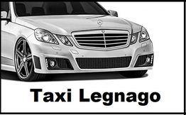 Auto bianca con scritto "Taxi Legnago" sotto.