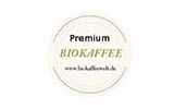 Label "Premium Bio Kaffee" auf weißem Hintergrund mit Website-URL.