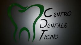 Logo di Centro Dentale Ticino con disegno di un dente stilizzato in verde.