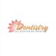 Logo with a pink lotus and the text "Dentistry at Kennesaw Point" in elegant script.