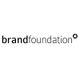 Schwarz-weißer Text "brandfoundation" mit kleinem Kreis oben rechts.