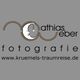 Logo mit Text: "Mathias Weber Fotografie" und "www.kruemels-traumreise.de" auf grauem Hintergrund.