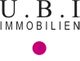 Textlogo: "U.B.I IMMOBILIEN" mit einem pinken Punkt darunter.
