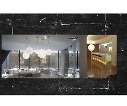 Modernes Café mit großen Glasfenstern und weißen Hängelampen; daneben ein stilvoller Barbereich.