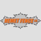 Logo with "HEMET FENCE CO." over chain-link fence graphic on a gray background.