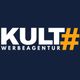 KULT Werbeagentur Logo mit gelbem Hashtag auf dunkelblauem Hintergrund.