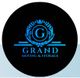 Logo of Grand Moving & Storage with ornate blue design on black background.