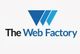 Logo with blue triangles above "The Web Factory" text in black and blue.