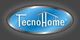 Logotipo de TecnoHome, texto blanco sobre fondo azul ovalado con borde gris.