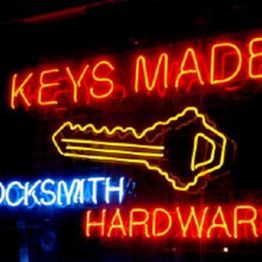 Neon sign with text: "Keys Made, Locksmith, Hardware" with a key outline.