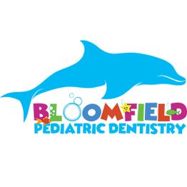 Blue dolphin above colorful "Bloomfield Pediatric Dentistry" text with aquatic themed letters.