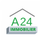 Logo d'A24 Immobilier avec toit stylisé et texte vert sur fond blanc.