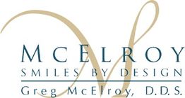 McElroy Smiles by Design logo with elegant script and design accents.