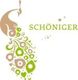 Logo: Stilisiertes Gesicht mit floralen Mustern, daneben der Schriftzug "Schöniger" in Grün.