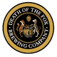 "Death of the Fox Brewing Company logo with a fox and dog around a barrel."