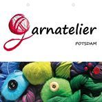 Logo des Garnateliers Potsdam mit bunter Wolle im Vordergrund.