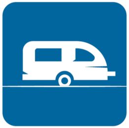 Piktogramm mit weißem Wohnwagen auf blauem Hintergrund.