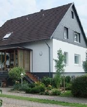 Ferienwohnung" Zum Scharfenberg" Logo