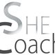 Logo mit Text „SHE Coach“ in Schwarz und Grau.