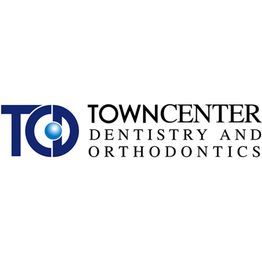 Logo of Town Center Dentistry and Orthodontics with blue circle and text on white background.