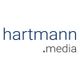 Logo mit blauem Schriftzug "hartmann" und grauem ".media" auf weißem Hintergrund.