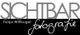 Logo mit Schriftzug: "SICHTBAR Tanja Wittkugel fotografie" in Grautönen.