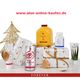 Aloe-Produkte mit Geschenken, Tannenbaum-Deko und Website-URL www.aloe-online-kaufen.de.